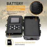 Open trail camera battery compartment