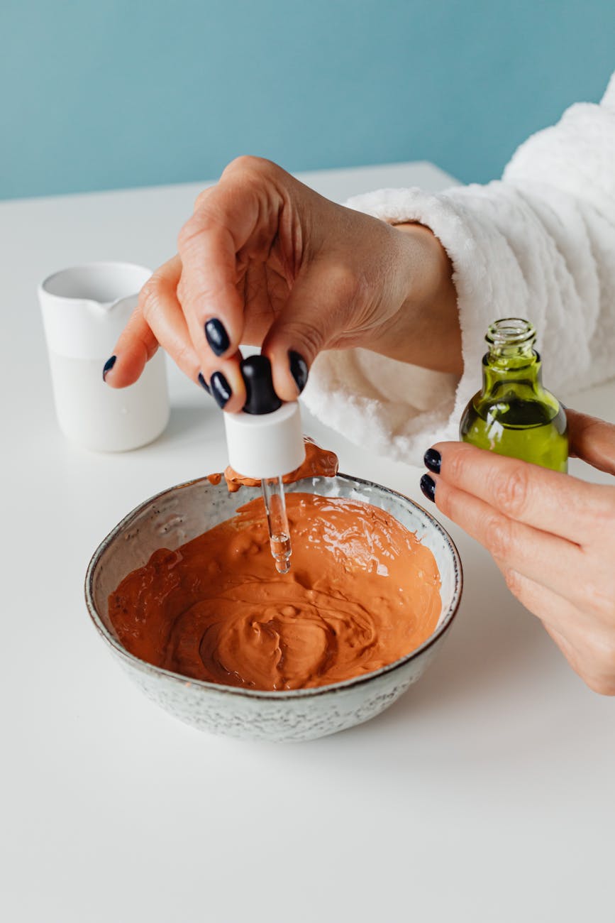 Photos gratuites de argile orange, aromathérapie, arrière-plan bleu