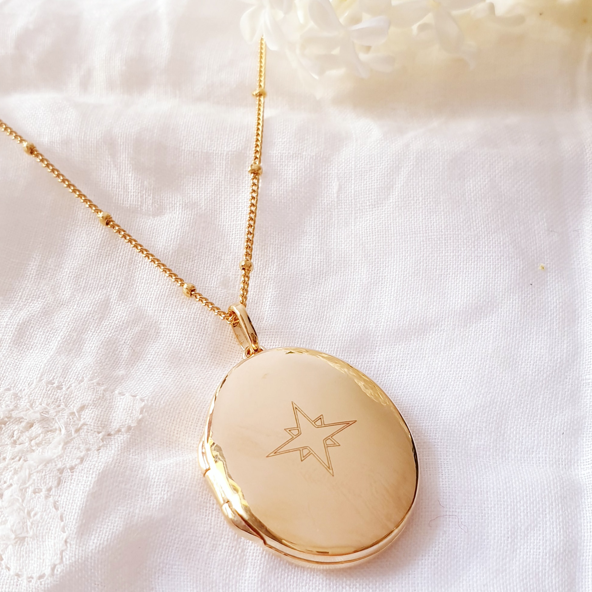 collier grave femme dessin etoile nord grande cachottiere