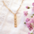 collier barre grave or