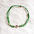bracelet-ete-cauri-cordon-vert-en-solde