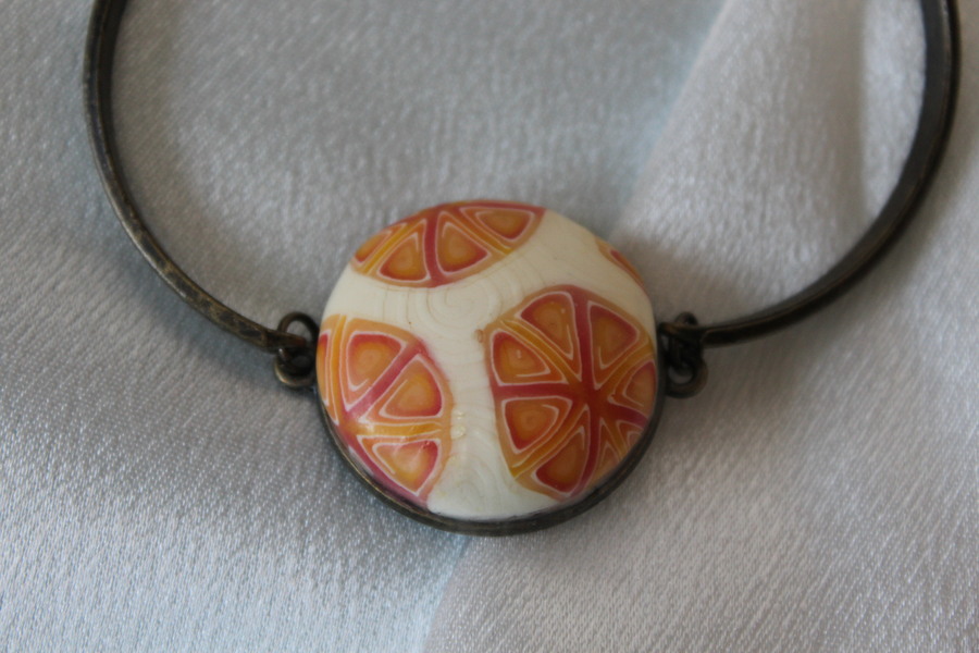 Bracelet-Acier-Bronze-Cabochon-Rond-Polymere-Orange-Vanille-2