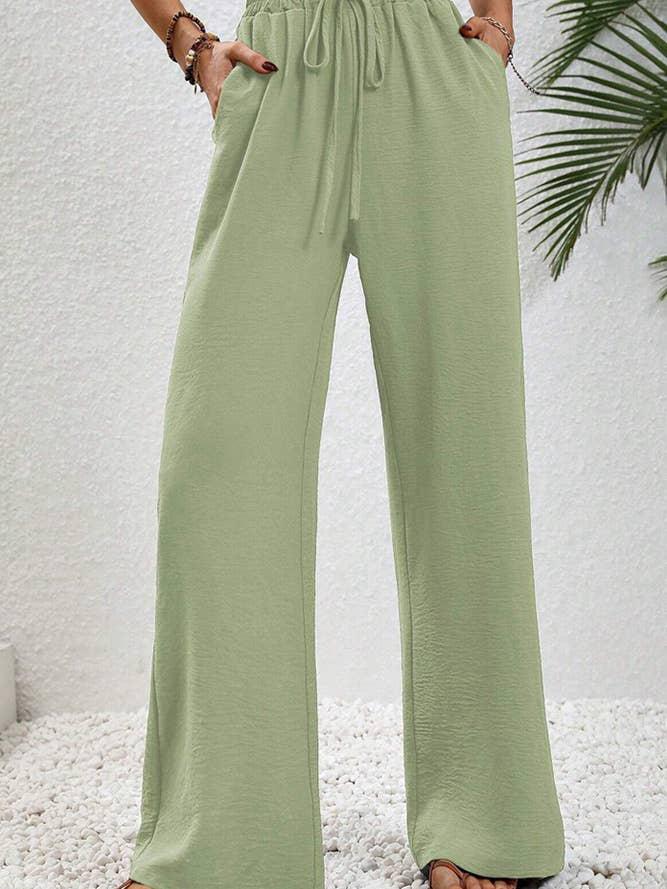 Pantalon uni taille haute à jambes larges