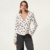 chemisier blanc à pois col V femme