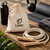 1-Corde-a-sauter-en-coton-recycle-avec-poignees-bois-ambiance1