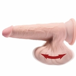 Gode réaliste et testicules palpables