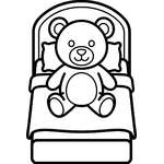 doudou ours posé sur un lit