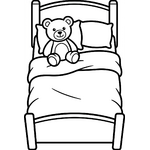 lit avec doudou posé sur l’oreiller
