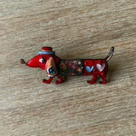 teckel chapeau rouge