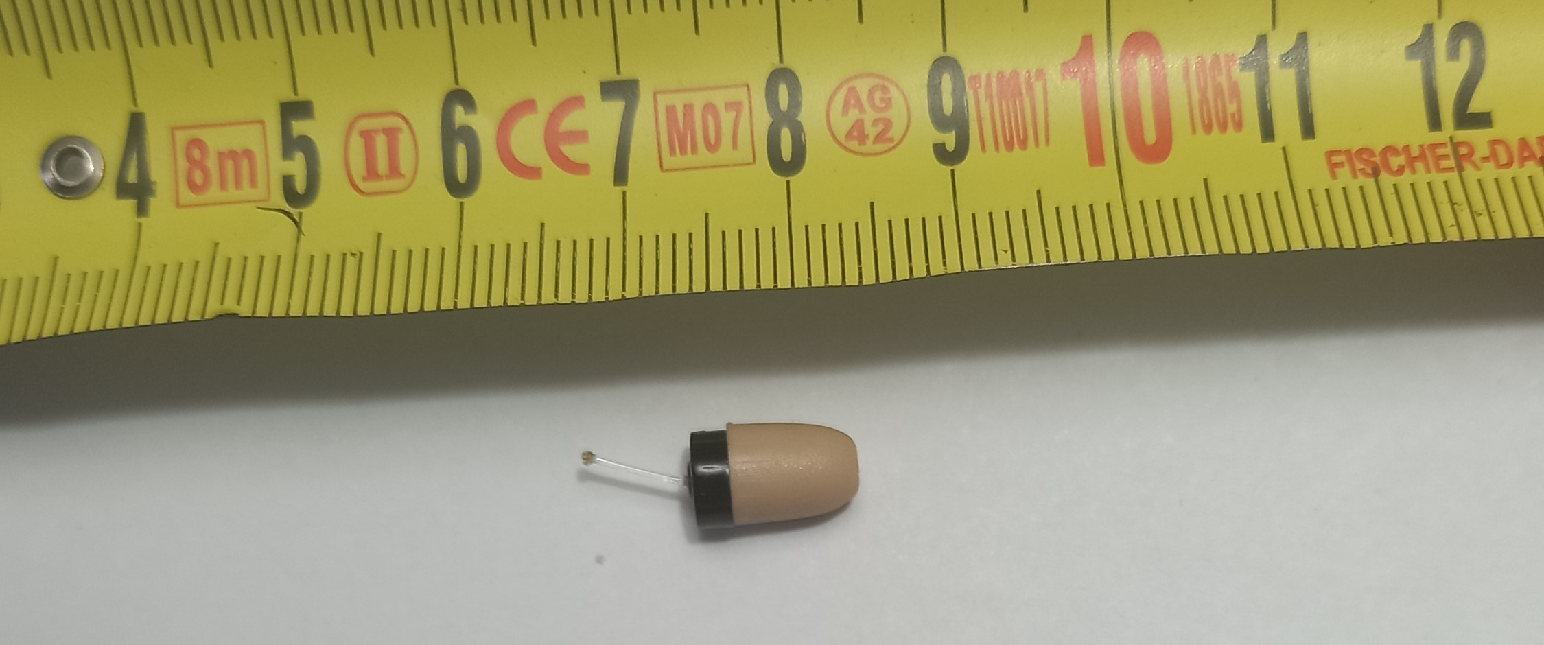 Oreillette microphone espion