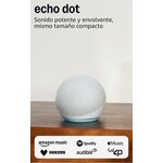 Echo Dot bianco su un mobile con servizi audio compatibili