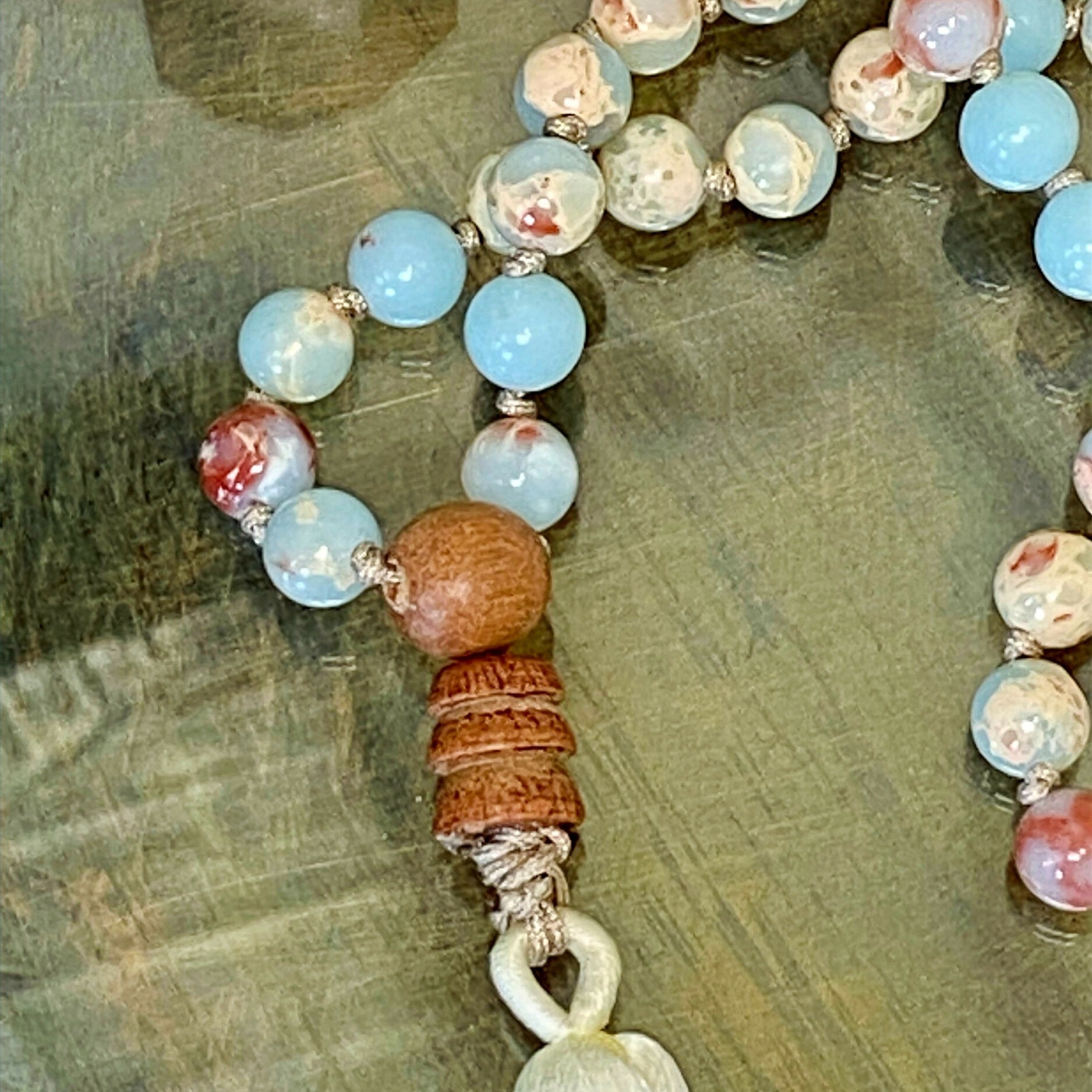 Perle gourou en bois de jujubier et pompon du mala