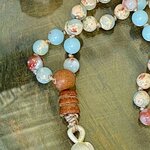 Perle gourou en bois de jujubier et pompon du mala