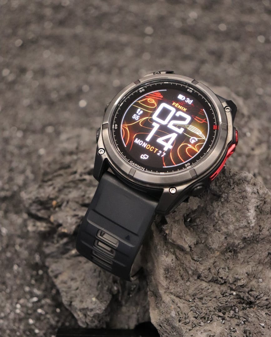 modern fenix 8 smartwatch with fiery display elegantly showcased on textured background