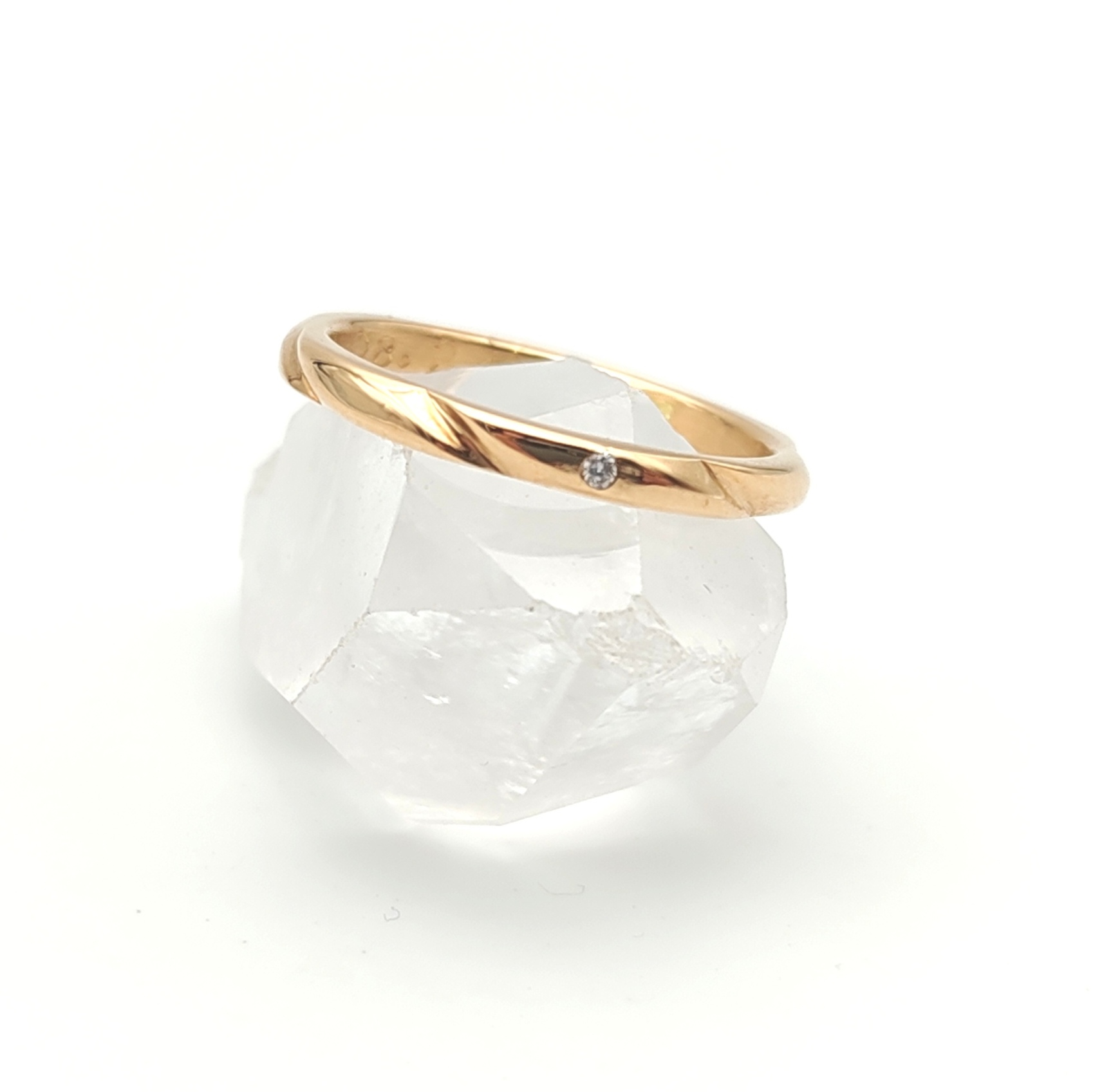 Bague or 750 sculptée wave et diamant