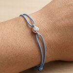 Bracelet diamant sur cordon porté