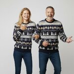 Stel in marineblauwe kersttrui Kerstsprankel met sneeuwvlokken en sneeuwpoppen