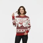 Vrouw in foute kersttrui Christmas is Coming met jacquardranden