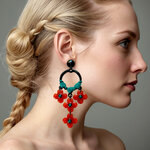 Boucles-d-oreilles-fleurs-oranges-xxl-mannequin
