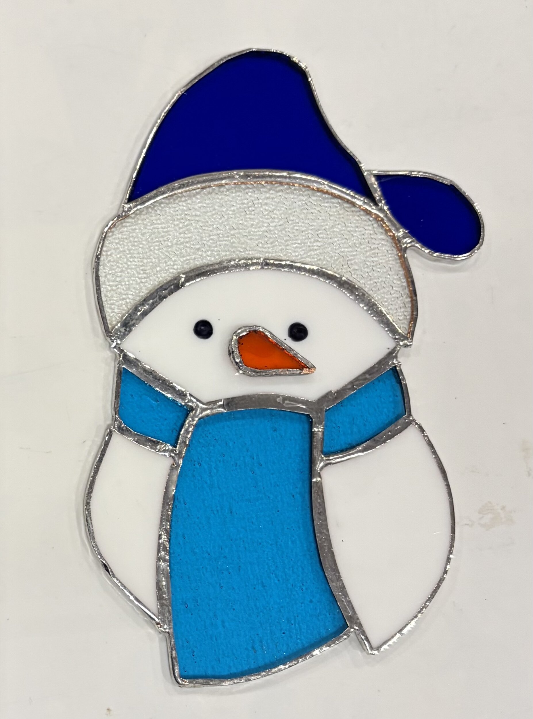 Vitrail bonhomme de neige bleu en verre teinté