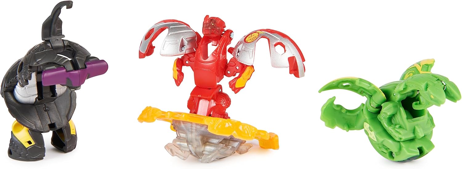 Les trois Bakugan ouverts : Hammerhead noir, Dragonoid rouge sur sa base, Nillious vert