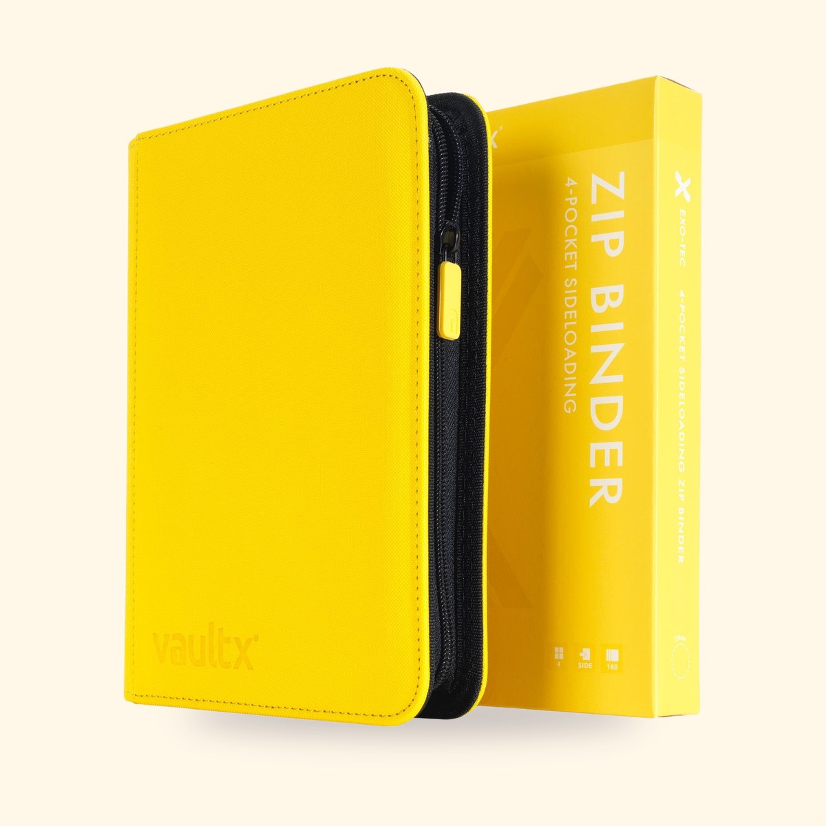 Mini classeur Vault X jaune à 4 pochettes et sa boîte, sur fond crème
