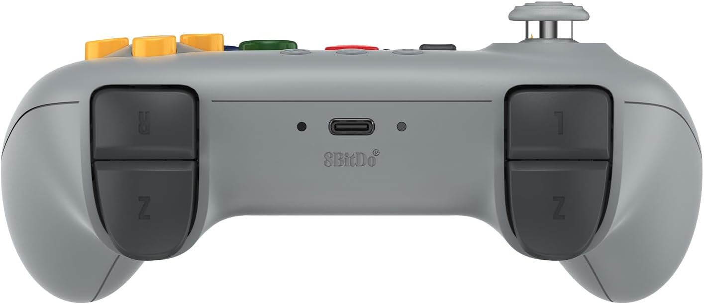 Tranche supérieure de la manette 8BitDo 64 grise : gâchettes et port USB-C