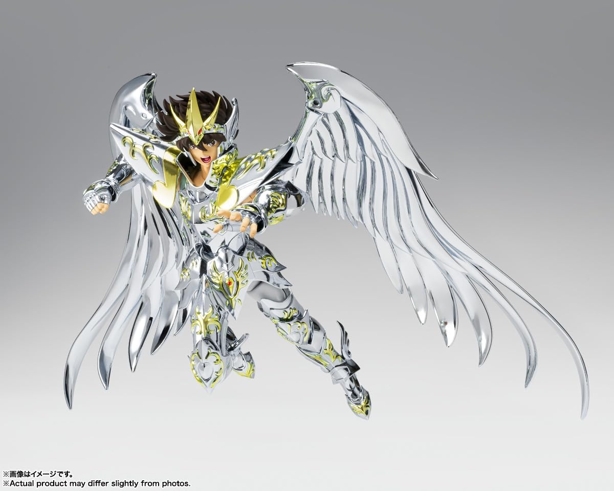 Figurine de Seiya en armure divine dans une pose de combat, ailes ouvertes
