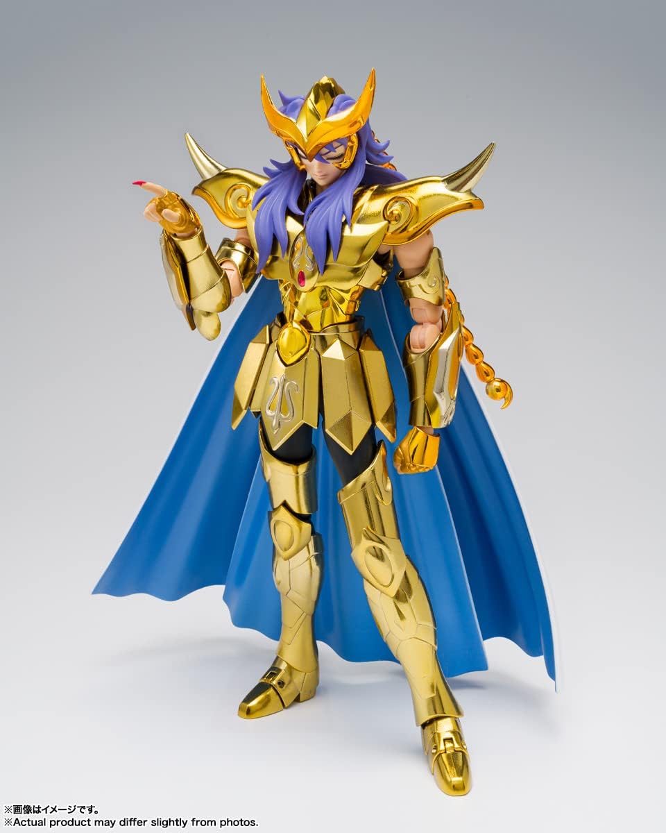 Milo, index tendu, avec la queue de scorpion de son armure