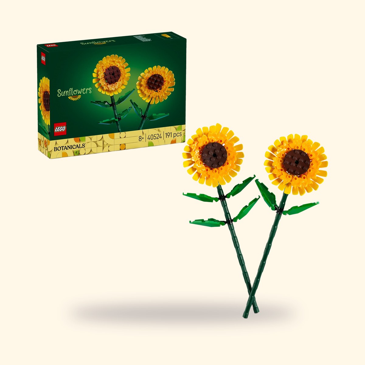 LEGO Botanicals 40524 Tournesols, boîte et deux fleurs montées sur fond crème