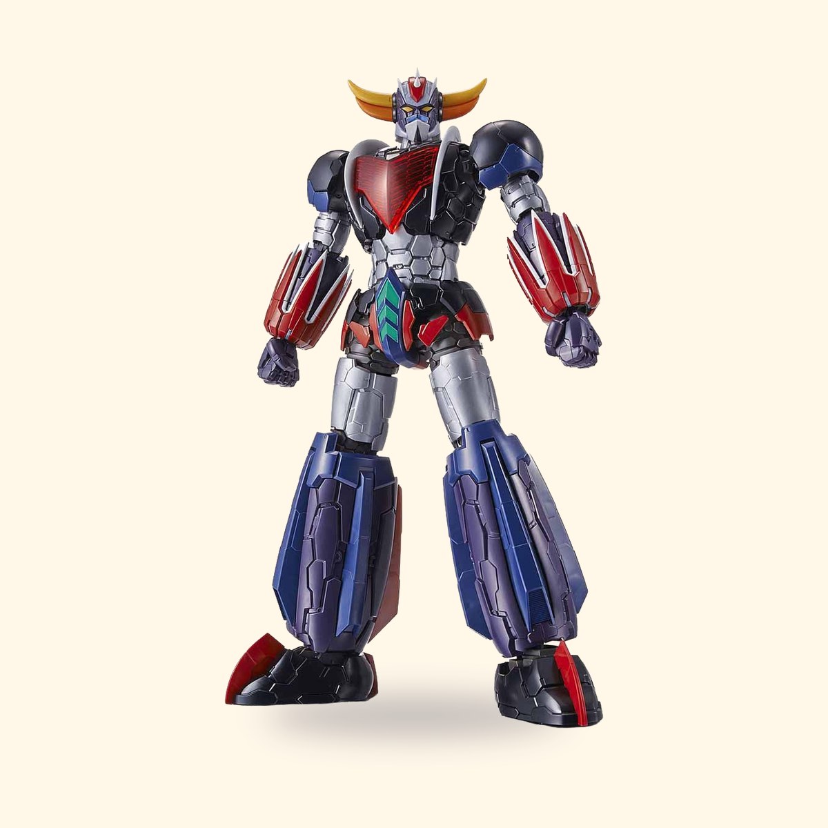 Maquette Bandai HG Goldorak Infinitism montée sur fond crème