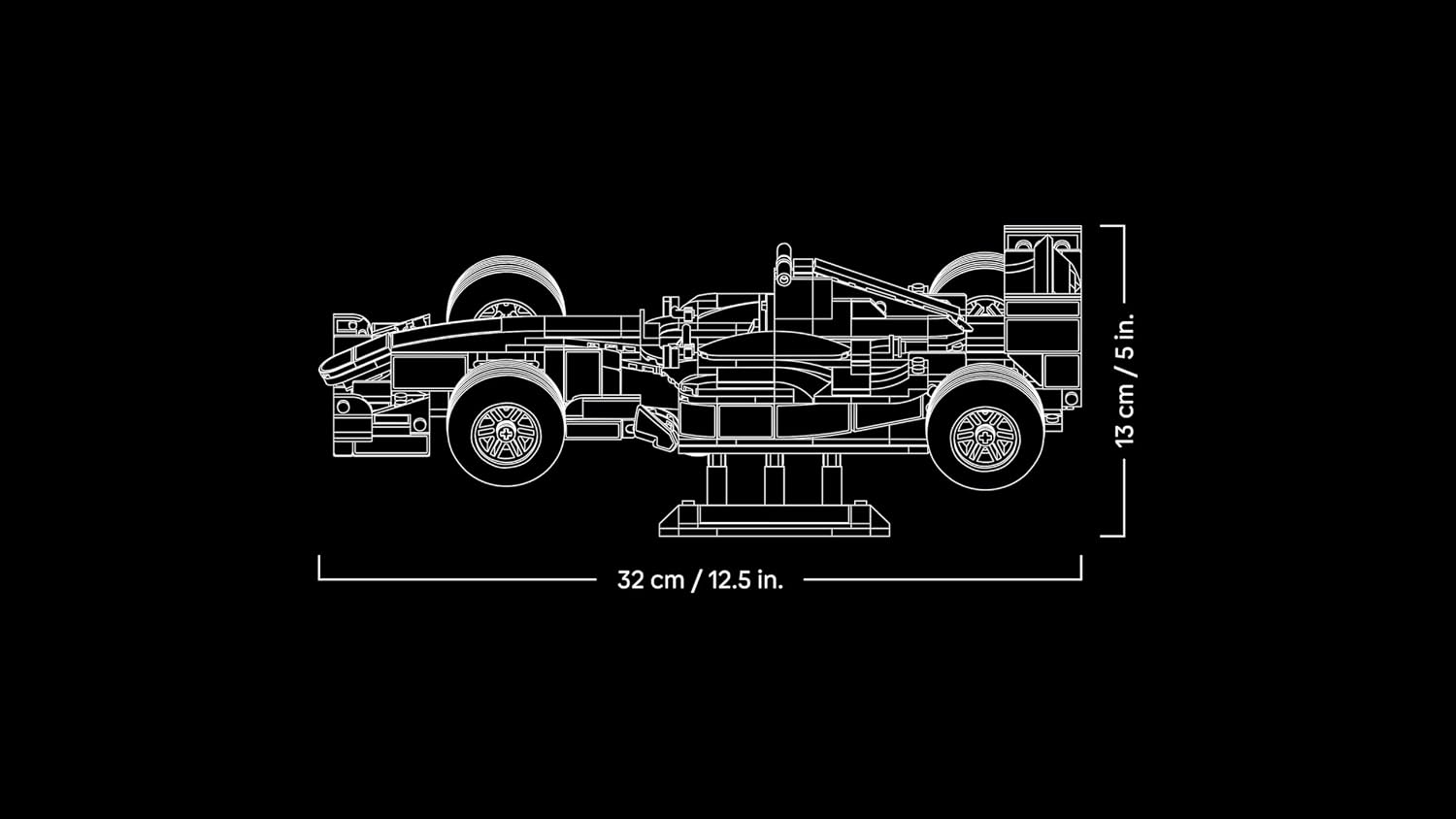 Schéma des dimensions de la Ferrari sur son présentoir : 32 cm de long, 13 cm de haut