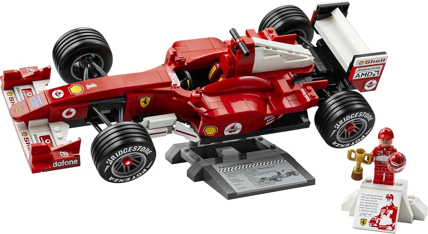 Ferrari F2004 LEGO sur son présentoir et minifigurine de Schumacher, sur fond blanc
