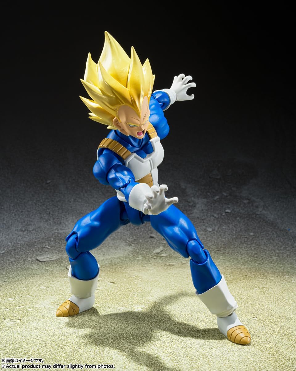 Vegeta en posture de combat, mains ouvertes en griffes, sur fond sombre