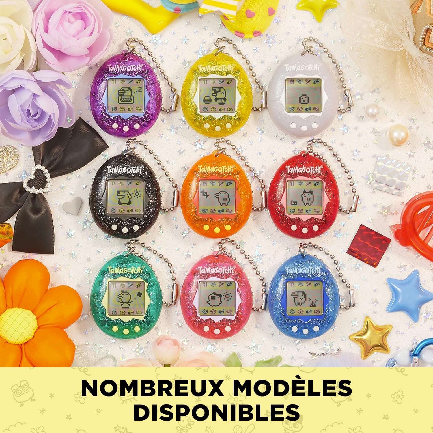 Neuf Tamagotchi Color Collection de couleurs différentes alignés sur trois rangs