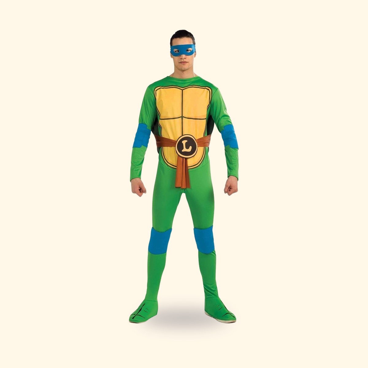 Déguisement adulte Leonardo des Tortues Ninja Rubie's porté de face, masque bleu et plastron imprimé, sur fond crème