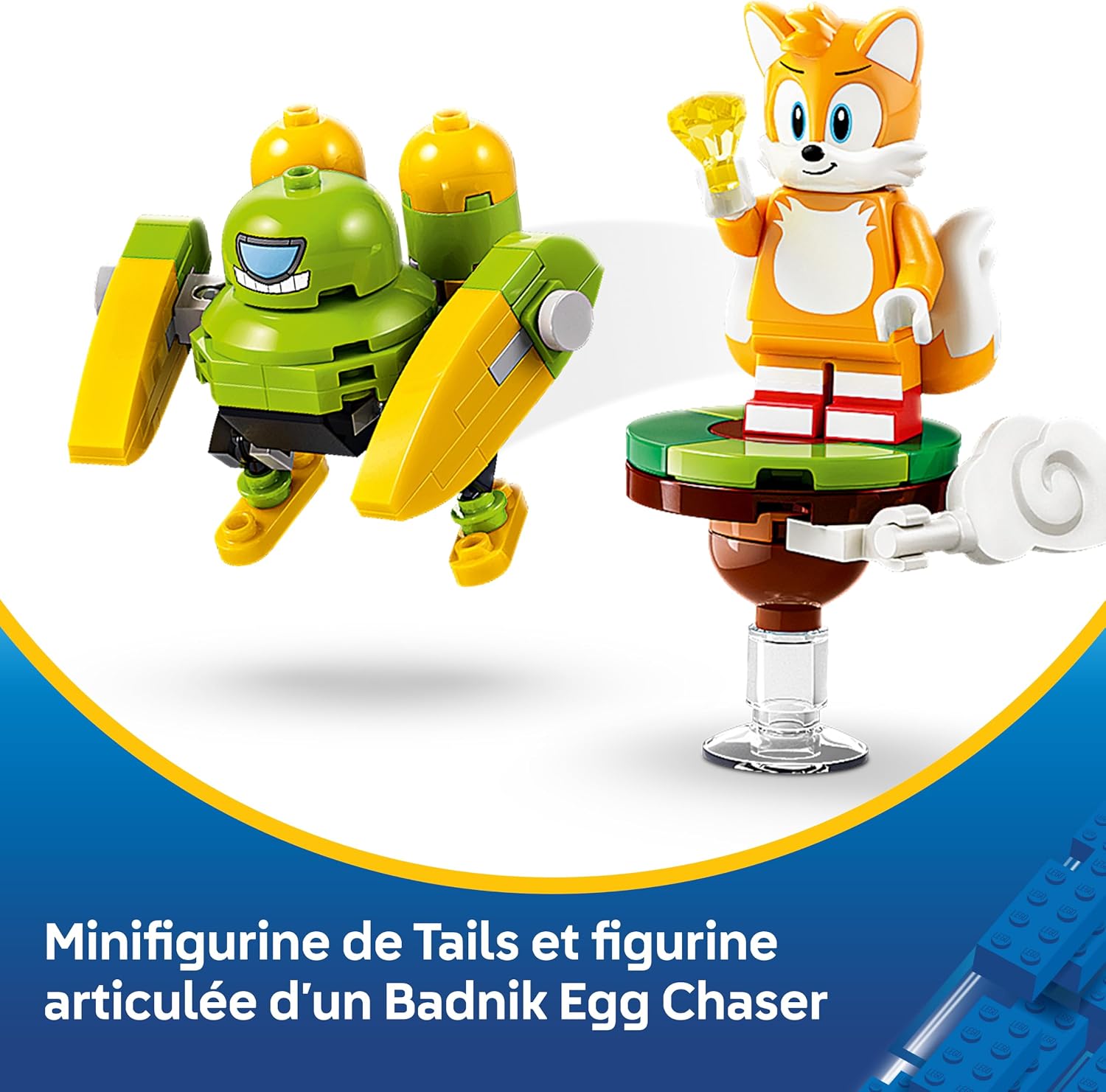 Gros plan sur le Badnik Egg Chaser et la minifigurine de Tails sur son île, légende en français