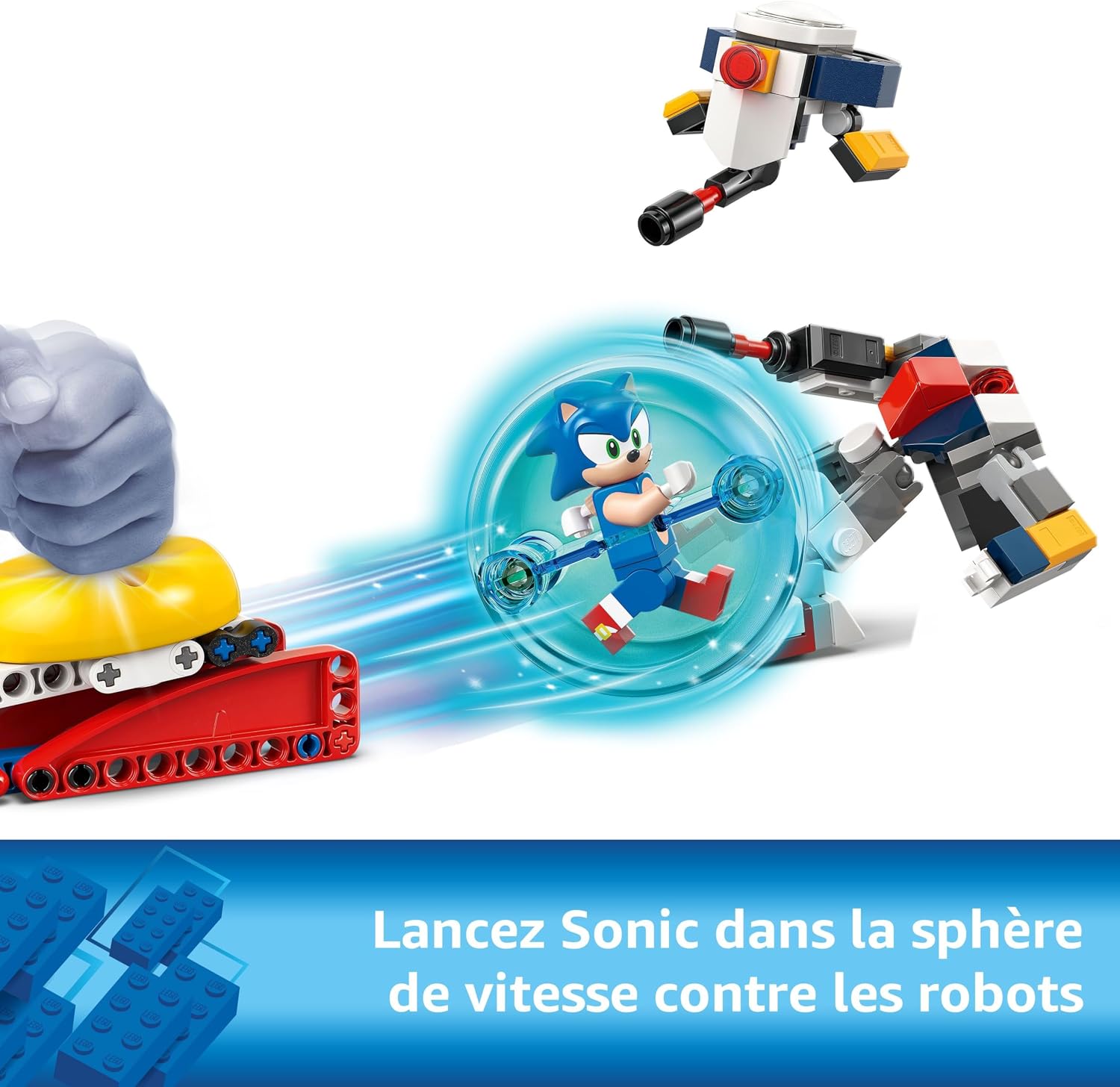 Main qui appuie sur le lanceur et propulse Sonic dans sa sphère vers les robots, légende en français