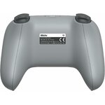 Dos de la manette 8BitDo 64 grise avec son étiquette