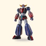 Maquette Bandai HG Goldorak Infinitism montée sur fond crème