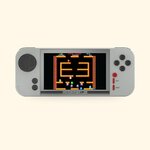 Console Evercade EXP-R Classic Retro grise et rouge, vue de face, sur fond crème