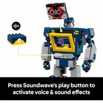 Torse de Soundwave avec une cassette qui sinsère et le schéma de la brique sonore