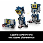 Étapes de la transformation de Soundwave en lecteur de cassettes, avec Ravage et Laserbeak