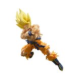 Goku Super Saiyan torse nu, mains jointes sur le côté pour un Kamehameha, sur fond blanc