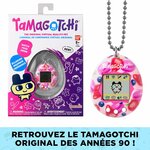 Boîte du Tamagotchi Original GEN1 et lappareil Berry Delicious sur sa chaîne à billes