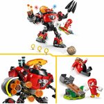 Trois vues : lEgg Crusher avec Dr Eggman au cockpit, son lanceur rotatif, et Knuckles près de la catapulte