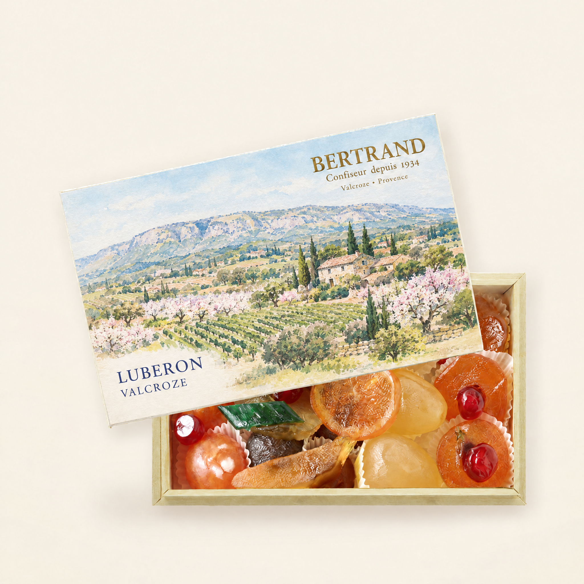Coffret Luberon de fruits confits assortis Bertrand, décor de vignes et vergers du Luberon