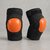Paire de coudières en néoprène noir, coque orange