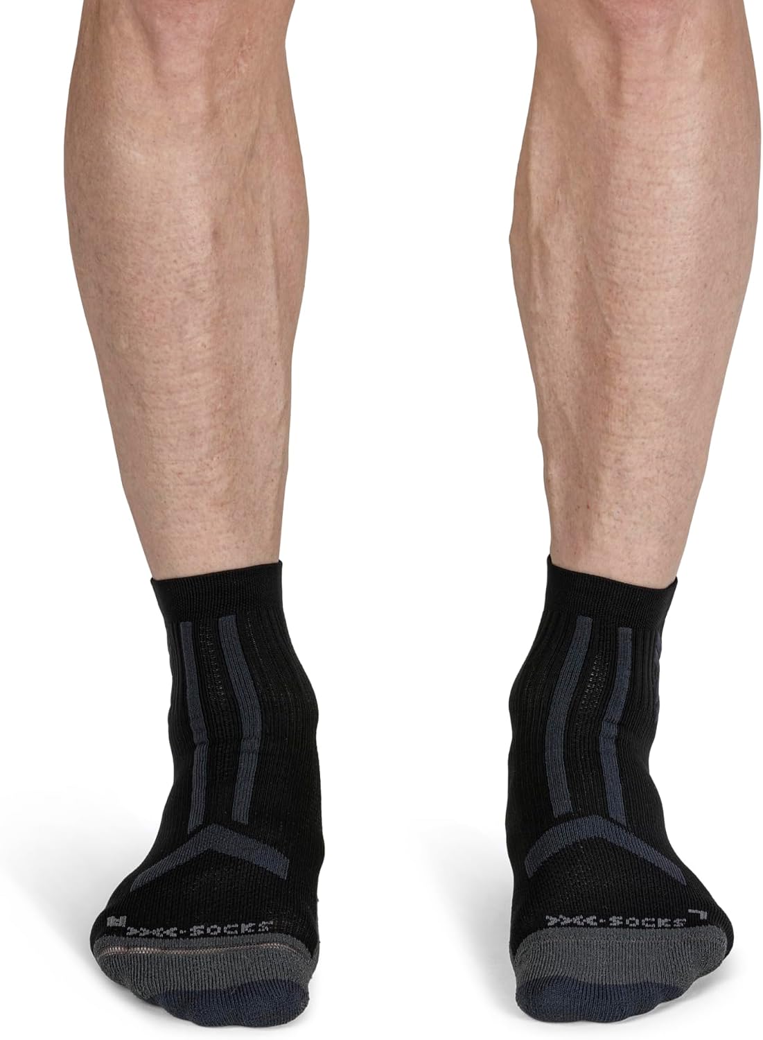 Piedi con calze X-Socks Trailrun Discover nere viste di fronte