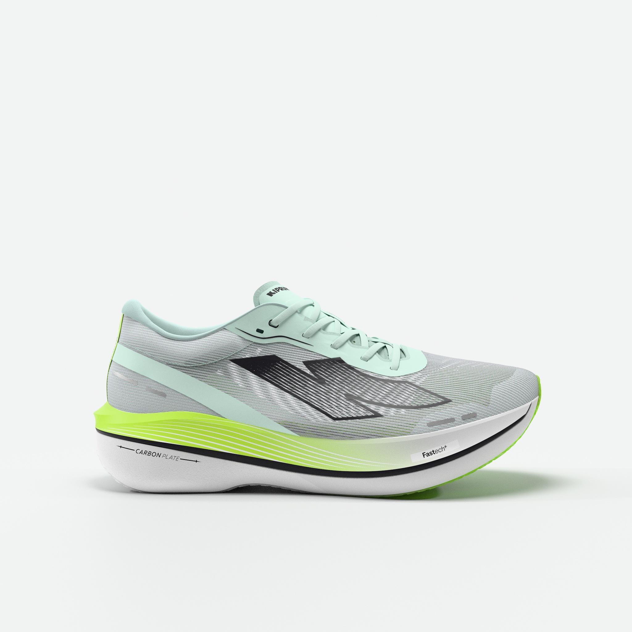 Scarpa running Kiprun Kipstorm Challenger grigia e verde menta vista di lato con lintersuola giallo lime